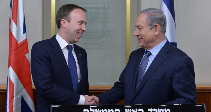 Freude über neue Richtlinien: Israels Premier Netanjahu (r.) und der britische Kabinettsminister Hancock