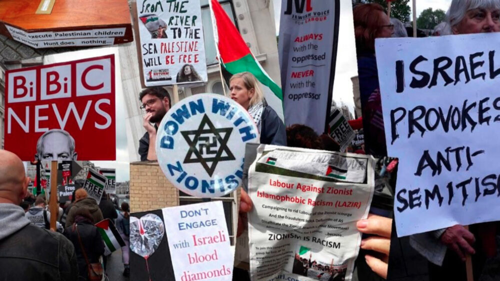 Die Teilnehmer der Kundgebung trugen Plakate mit Sprüchen wie „Nieder mit dem Zionismus“ und „Israel provoziert Antisemitismus“ mit sich