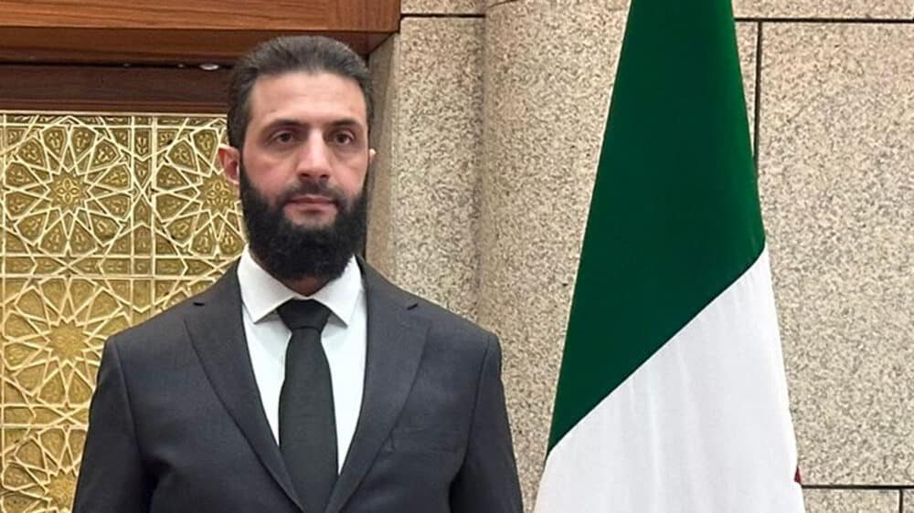 Al-Schar'a bei einem Treffen mit dem ukrainischen Außenminister Andrii Sybiha im Dezember 2024 in Damaskus