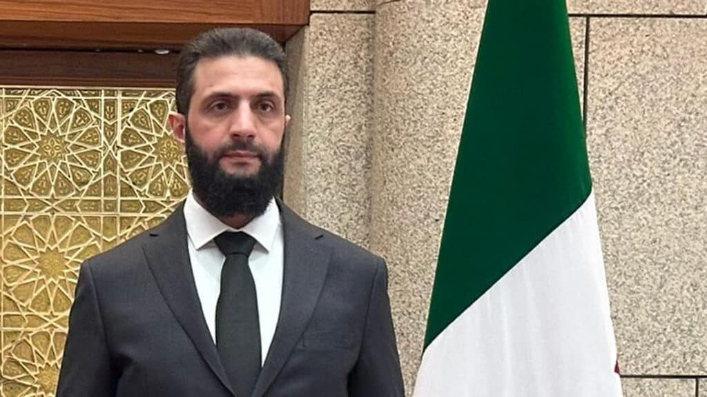 Al-Schar'a bei einem Treffen mit dem ukrainischen Außenminister Andrii Sybiha im Dezember 2024 in Damaskus